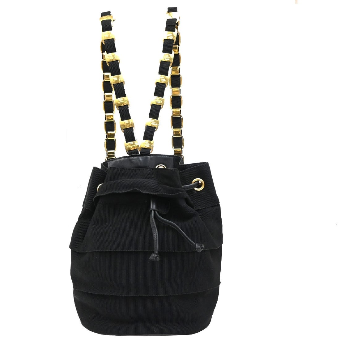 Black Canvas Vala Backpack by Salvatore Ferragamo for Women: Black Canvas Vala Backpack by Salvatore Ferragamo for Women This Salvatore Ferragamo Vala Backpack is crafted from black canvas and designed for women. Made in Italy, it features a practical shape wit