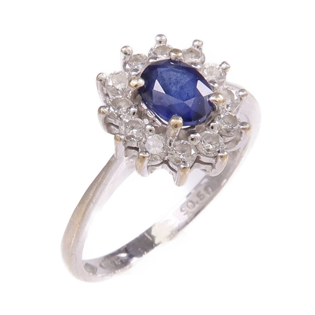 Sapphire and Diamond 18K White Gold Ring Size 4.25: Sapphire and Diamond 18K White Gold Ring Size 4.25 This elegant ring features a vibrant blue sapphire as the centerpiece, set in 18K white gold. Accented with diamonds, the ring is designed in a class