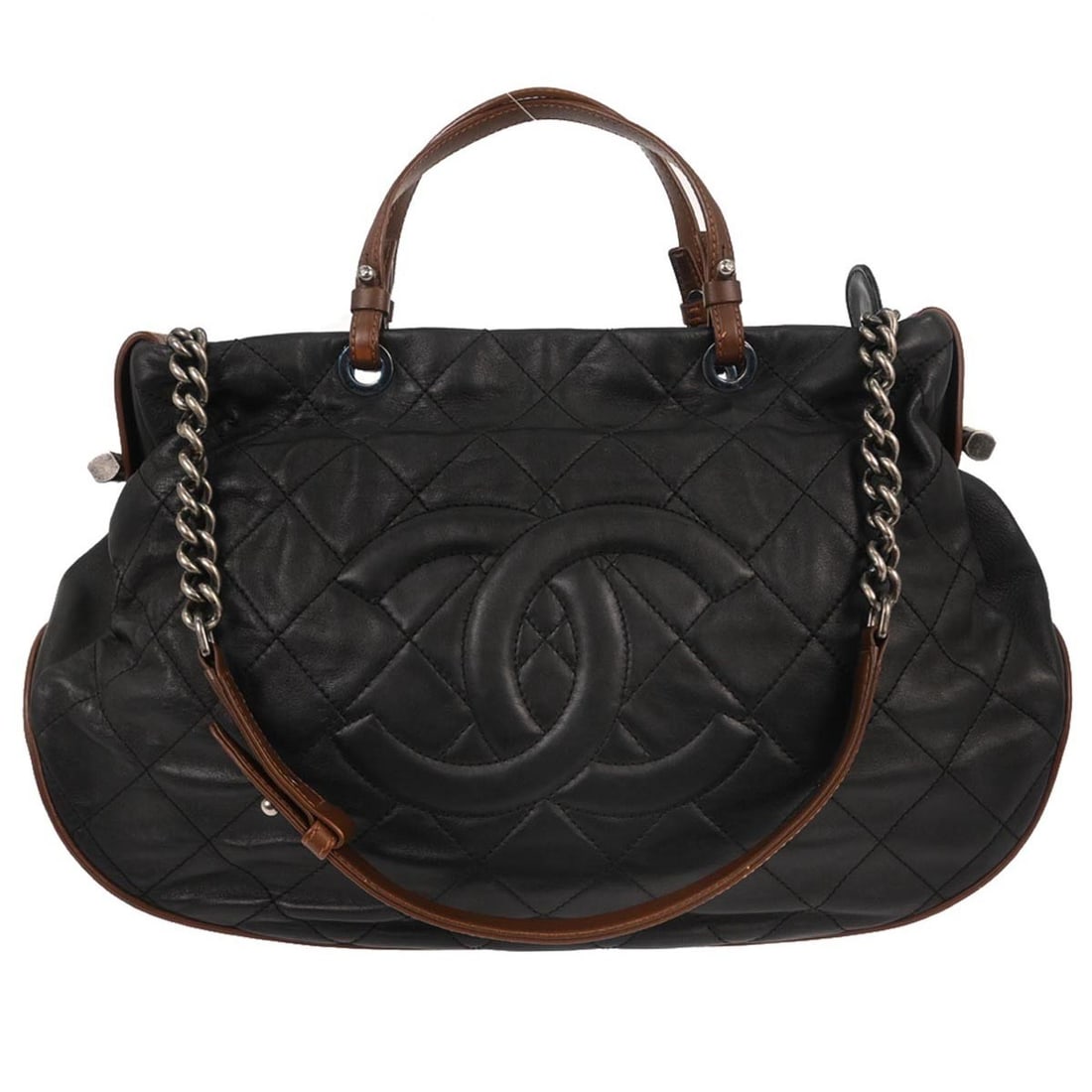Large Black Lambskin Tote from Chanel Country Chic Collection: Large Black Lambskin Tote from Chanel Country Chic Collection This Chanel Country Chic tote handbag features black lambskin leather with a classic logo accent. It is designed with a spacious large siz