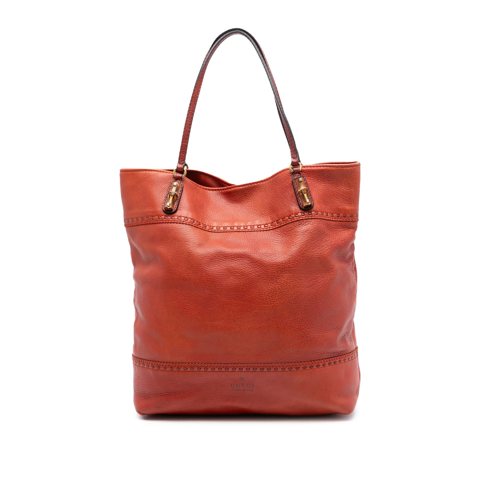 Gucci Crafty Orange Leather Tote with Bamboo Strap Details: Gucci Crafty Orange Leather Tote with Bamboo Strap Details This Gucci Large Leather Laidback Crafty Tote features an orange leather body with flat leather straps accented by bamboo details. The open t