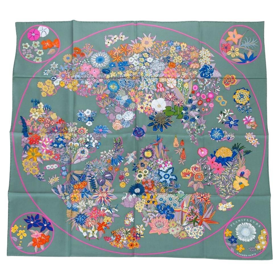 Hermes Planifleurs Silk Scarf Teal Green Floral Motif 34in: Hermes Planifleurs Silk Scarf Teal Green Floral Motif 34in Elevate your style with this exquisite Hermes "Planifleurs" Silk Scarf, showcasing a vibrant teal green hue adorned with a colorful floral mo