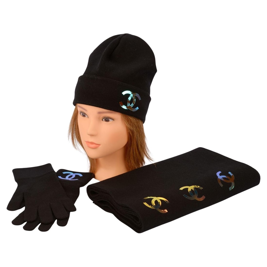 Chanel Iridescent Logo Black Cashmere Hat Scarf Glove Set: Chanel Iridescent Logo Black Cashmere Hat Scarf Glove Set Elevate your winter wardrobe with this elegant Chanel accessory set, crafted from luxurious black cashmere. This set features an iridescent, m