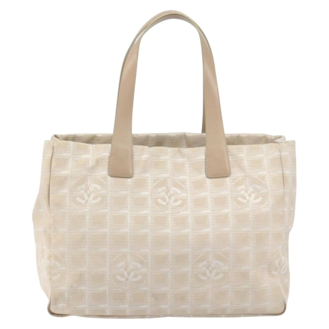 Beige Nylon Tote Chanel Travel Line Front Zip Italian Made: Beige Nylon Tote Chanel Travel Line Front Zip Italian Made This Chanel Front Zip Travel Line Tote is crafted from beige nylon and features a spacious design ideal for daily use. The tote is pre-owned