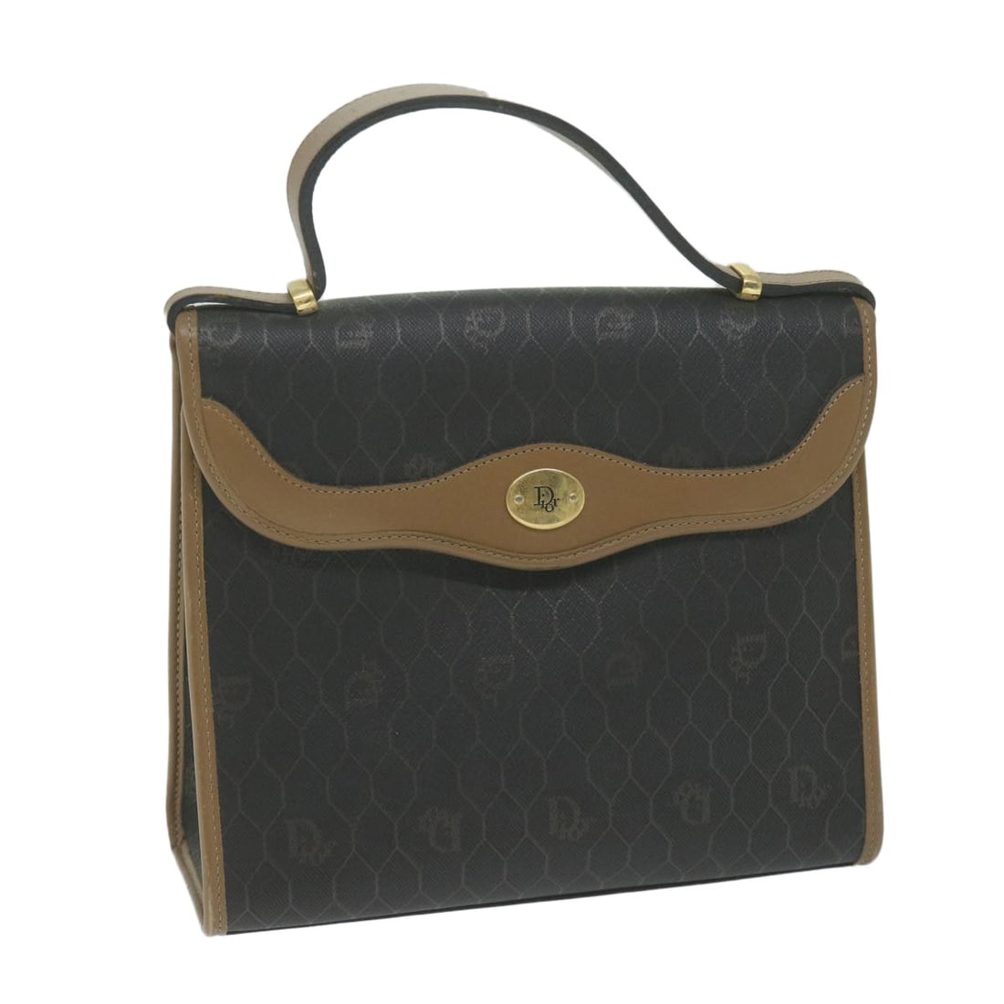 Christian Dior Vintage Honeycomb Canvas and Leather Handbag Black: Christian Dior Vintage Honeycomb Canvas and Leather Handbag Black This pre-owned Christian Dior vintage Honeycomb handbag features a black canvas exterior with leather details. Designed for women, it