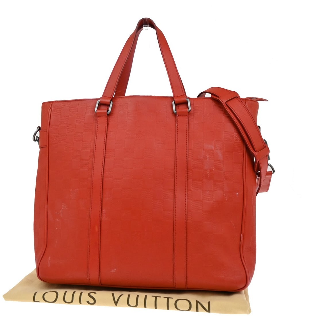 Red Damier Infini Leather Tadao Shoulder Bag by Louis Vuitton: Red Damier Infini Leather Tadao Shoulder Bag by Louis Vuitton This pre-owned Louis Vuitton Tadao PM handbag is crafted from red Damier Infini leather. Designed for women, it features a spacious interi
