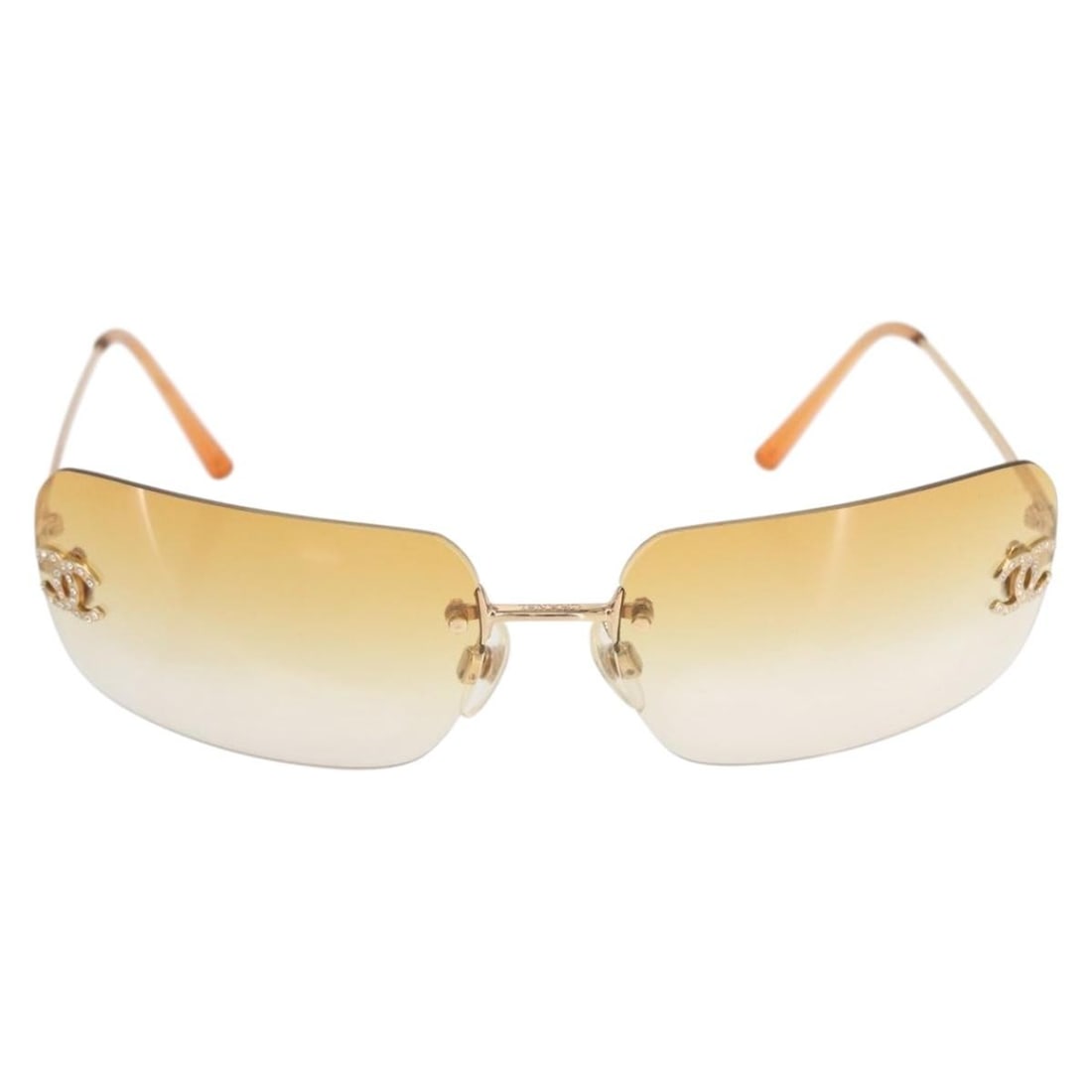 Metal Frame Chanel Womens Orange Logo CC Sunglasses: Metal Frame Chanel Womens Orange Logo CC Sunglasses Chanel Logo CC sunglasses designed for women feature an orange metal frame crafted in Italy. The sunglasses measure 13.5 cm in width, 3.9 cm in heig