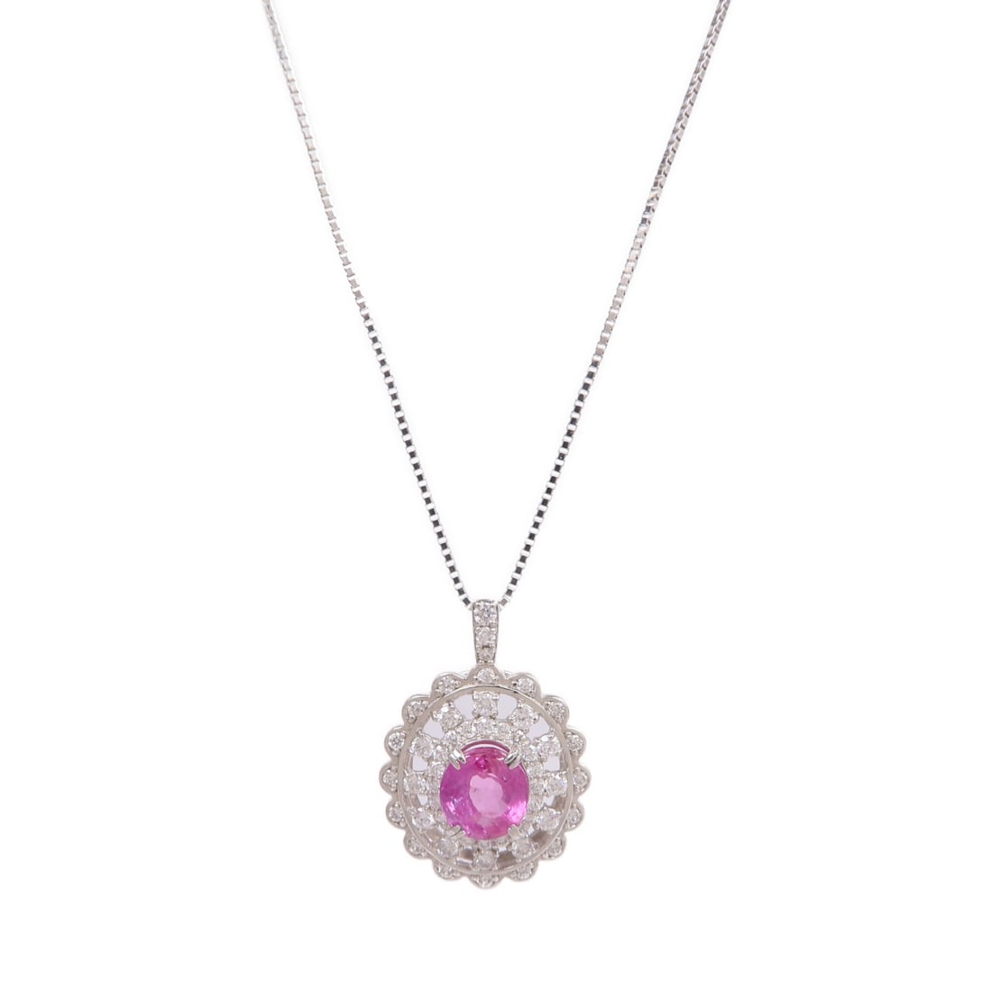 Platinum Necklace with Pink Sapphire and Diamond Accents PT900 PT850: Platinum Necklace with Pink Sapphire and Diamond Accents PT900 PT850 This necklace features a striking pink sapphire as its centerpiece, set in high-purity PT900 platinum. The platinum setting is comp