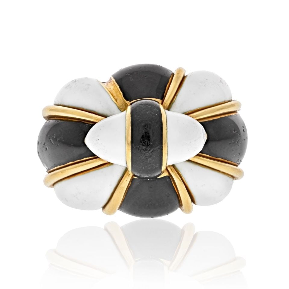 David Webb 18K Yellow Gold Black White Enamel Bombe Ring: David Webb 18K Yellow Gold Black White Enamel Bombe Ring This stunning David Webb bombe ring features a unique design crafted from 18K yellow gold and accented with striking black and white enamel. Kn