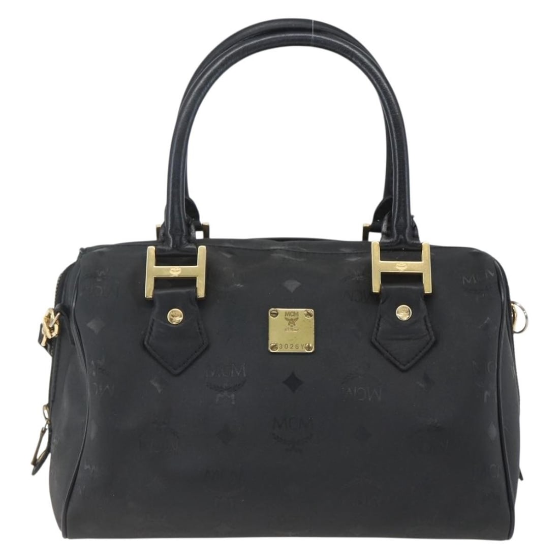 Visetos Logogramme Tote in Canvas and Leather by MCM: Visetos Logogramme Tote in Canvas and Leather by MCM This MCM Visetos logogramme handbag features a classic black canvas body with leather accents, designed for women. The bag is crafted in Germany an