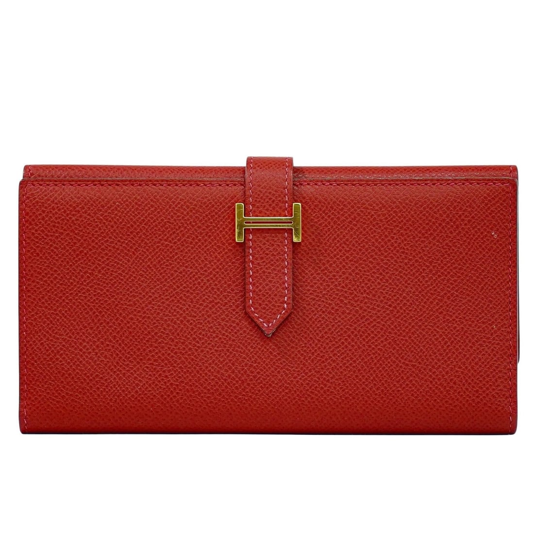 Red Leather Bearn Wallet by Hermes for Women: Red Leather Bearn Wallet by Hermes for Women This Hermes Bearn Wallet is crafted from red Epsom leather and designed for women. The wallet remains in very good pre-owned condition, with only minor sig