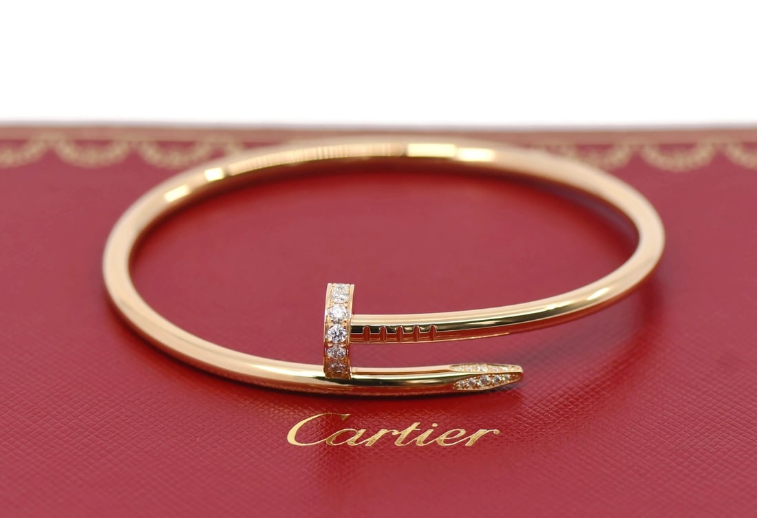 Cartier Juste un Clou Diamond 18K Rose Gold Bangle Bracelet: Cartier Juste un Clou Diamond 18K Rose Gold Bangle Bracelet This exquisite Cartier Juste un Clou bracelet is a stunning piece that combines luxury and elegance. Crafted from 18K rose gold, this bangle
