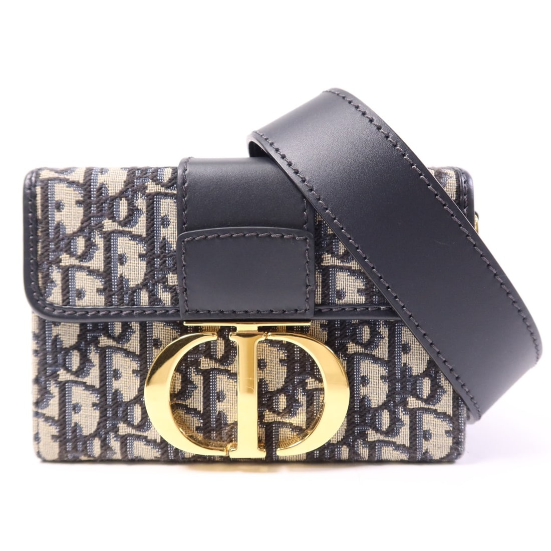 Dior 30 Montaigne Blue Canvas and Leather Shoulder Bag Gold Hardware: Dior 30 Montaigne Blue Canvas and Leather Shoulder Bag Gold Hardware This Christian Dior 30 Montaigne shoulder bag features blue leather with gold hardware. It offers a compact silhouette with a heigh