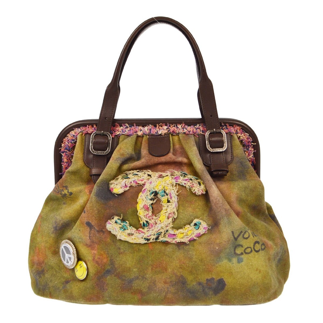 Chanel Khaki Green Canvas Graffiti Tote Handbag Made in Italy: Chanel Khaki Green Canvas Graffiti Tote Handbag Made in Italy This stylish Chanel tote handbag features a striking khaki green canvas exterior adorned with graffiti patterns, perfect for casual occasi