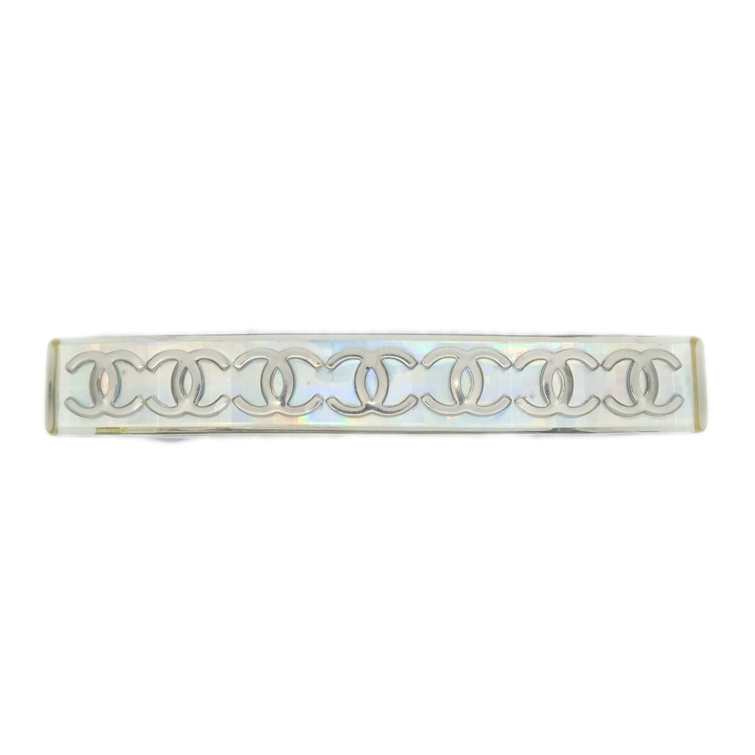 Chanel 97P/62 Clear Silver Plated Hair Clip Barrette with Logo: Chanel 97P/62 Clear Silver Plated Hair Clip Barrette with Logo Elevate your hairstyle with this stunning Chanel Hair Clip Barrette. Designed for casual occasions, this clear barrette features a sleek