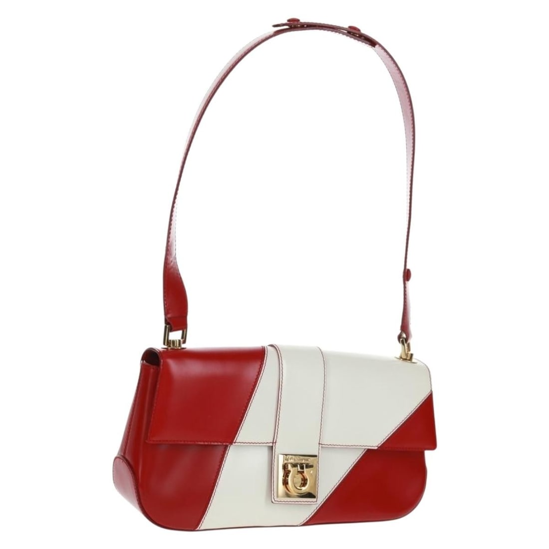 Red and White Leather Gancini Shoulder Bag by Salvatore Ferragamo: Red and White Leather Gancini Shoulder Bag by Salvatore Ferragamo This Salvatore Ferragamo Gancini shoulder bag features a red and white leather exterior with a structured silhouette. The bag includes
