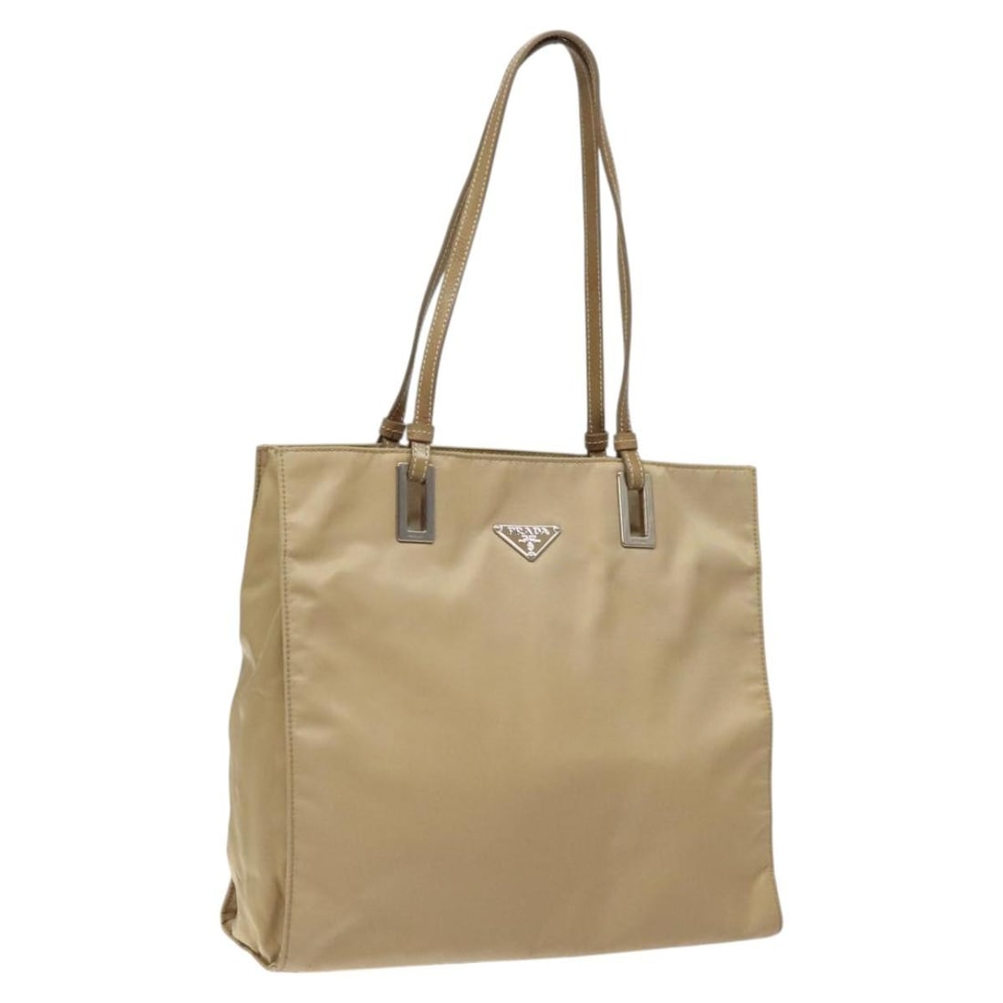 Prada Beige Nylon Women's Tote Bag 28cm by 26cm by 10cm: Prada Beige Nylon Women's Tote Bag 28cm by 26cm by 10cm This Prada Open Tote in beige nylon is designed for women and features a spacious interior with multiple pockets. The tote exhibits signs of wea