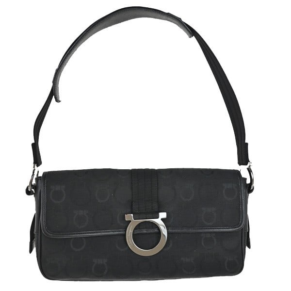 Gancini Canvas Shoulder Bag by Salvatore Ferragamo Black Italy: Gancini Canvas Shoulder Bag by Salvatore Ferragamo Black Italy This Salvatore Ferragamo Gancini shoulder bag is crafted from black canvas and designed for women. It features the signature Gancini styl