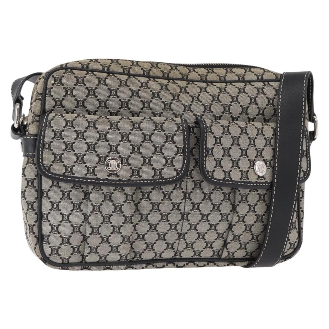 Vintage Macadam Canvas and Leather Shoulder Bag by Celine: Vintage Macadam Canvas and Leather Shoulder Bag by Celine This vintage Celine Macadam shoulder bag for women features a gray canvas body with leather accents. It measures 23cm x 17cm x 5cm and was mad