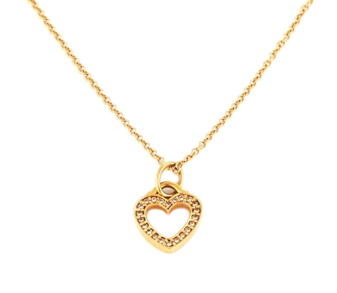 Tiffany & Co. Mini Heart Pendant Necklace 18k Rose Gold Diamond: Tiffany & Co. Mini Heart Pendant Necklace 18k Rose Gold Diamond This exquisite Tiffany & Co. necklace features a charming open heart pendant made from luxurious 18k rose gold, elegantly adorned with a