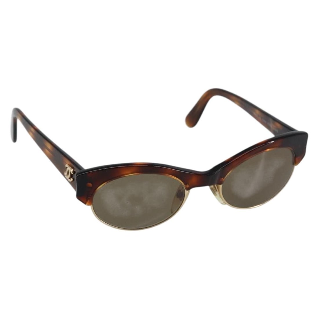 Brown Plastic Chanel CC Logo Women's Sunglasses Made in Italy: Brown Plastic Chanel CC Logo Women's Sunglasses Made in Italy These Chanel Logo CC sunglasses feature a brown plastic frame and are designed for women. The sunglasses are pre-owned and in very clean c