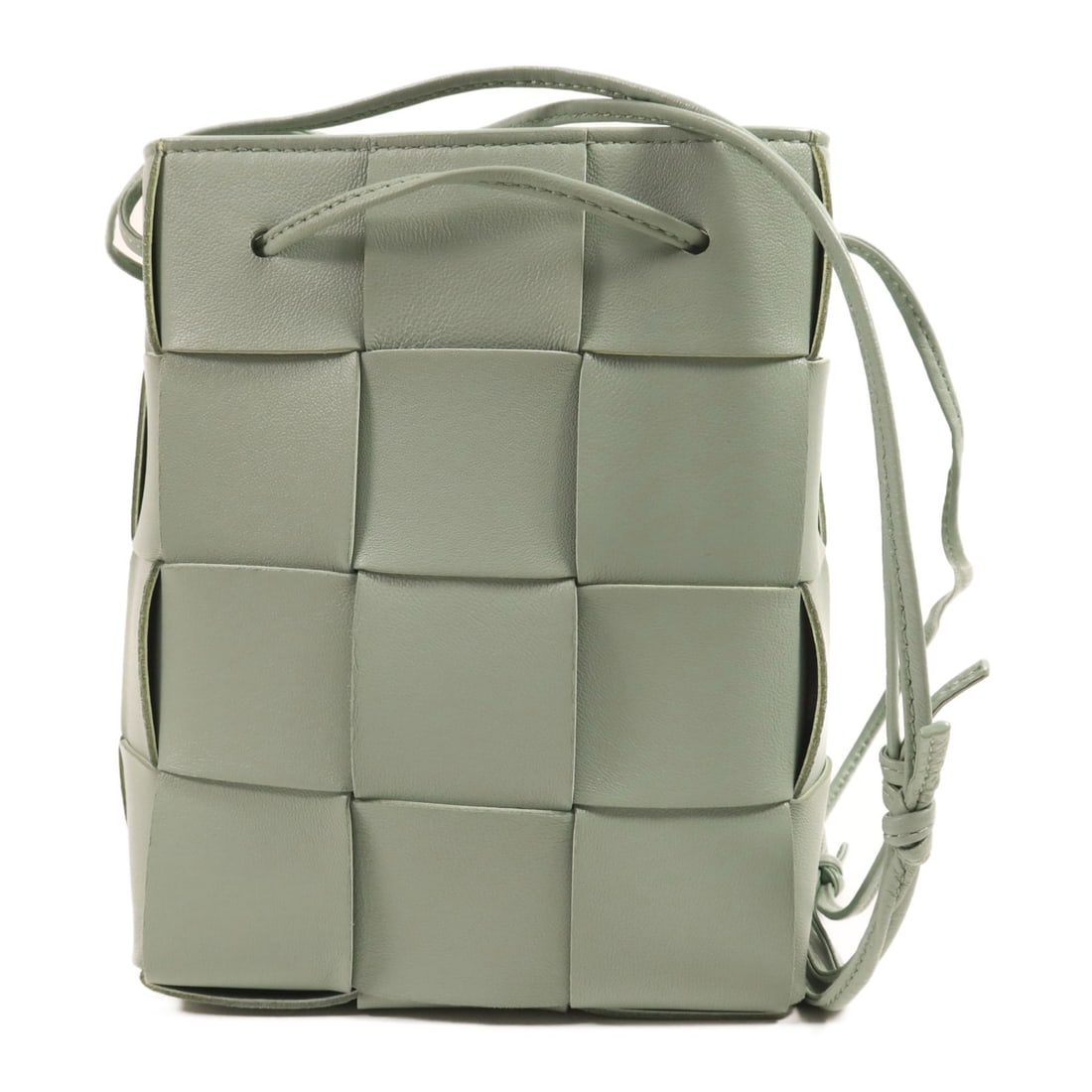 BOTTEGA VENETA BV Cassette Bucket Bag Light Green Calfskin Leather: BOTTEGA VENETA BV Cassette Bucket Bag Light Green Calfskin Leather This stylish Bottega Veneta BV Cassette Bucket Shoulder Bag is crafted from luxurious calfskin leather in a refreshing light green hu