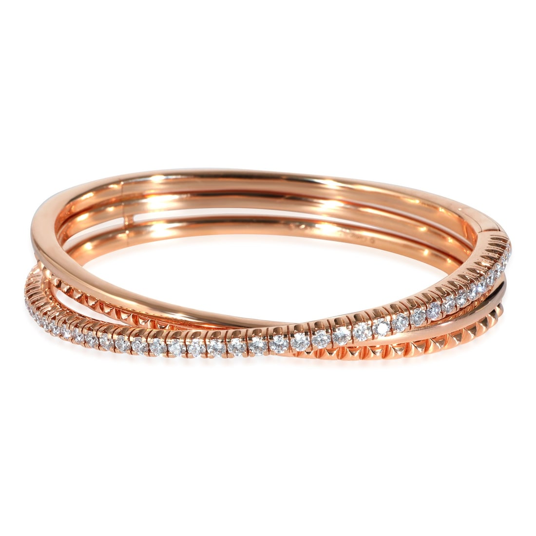 Etincelle de Cartier 18k Rose Gold Bracelet with Box and Certificate: Etincelle de Cartier 18k Rose Gold Bracelet with Box and Certificate This pre-owned Cartier Etincelle de Cartier bracelet is crafted from 18k rose gold and features a round brilliant design. The brace
