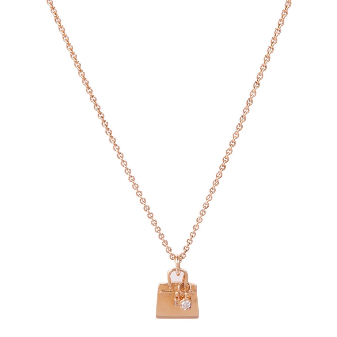 HERMES Amulettes Birkin Diamond Pendant Necklace 18K Rose Gold: HERMES Amulettes Birkin Diamond Pendant Necklace 18K Rose Gold Elevate your jewelry collection with this exquisite HERMES Amulettes Birkin Diamond Pendant Necklace, crafted from luxurious 18K pink gol