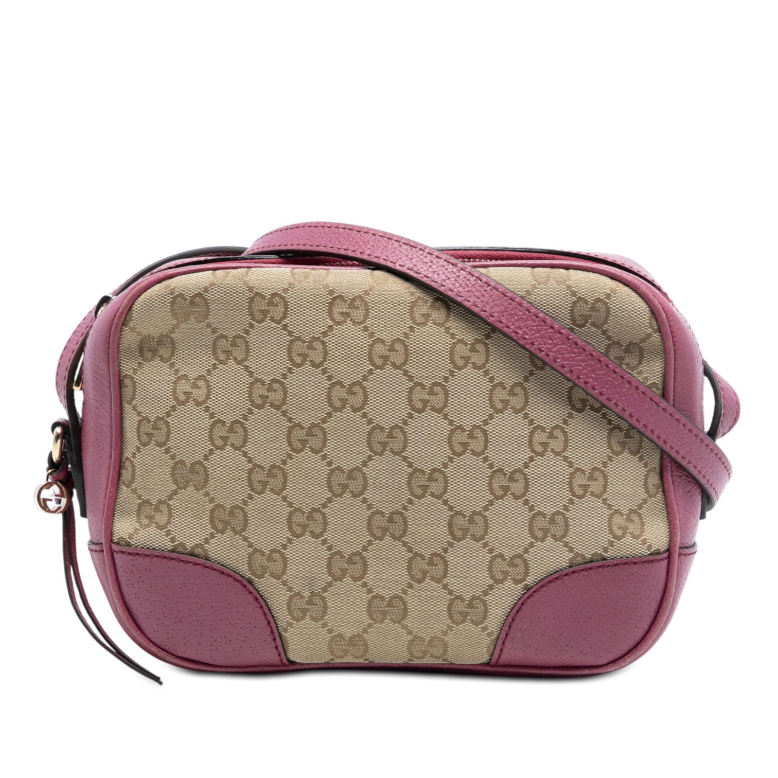 Brown GG Canvas Bree Crossbody Bag with Leather Trim by Gucci: Brown GG Canvas Bree Crossbody Bag with Leather Trim by Gucci This Gucci GG Canvas Bree Crossbody features a canvas body with leather trim, a flat leather shoulder strap, a top zip closure, and interi