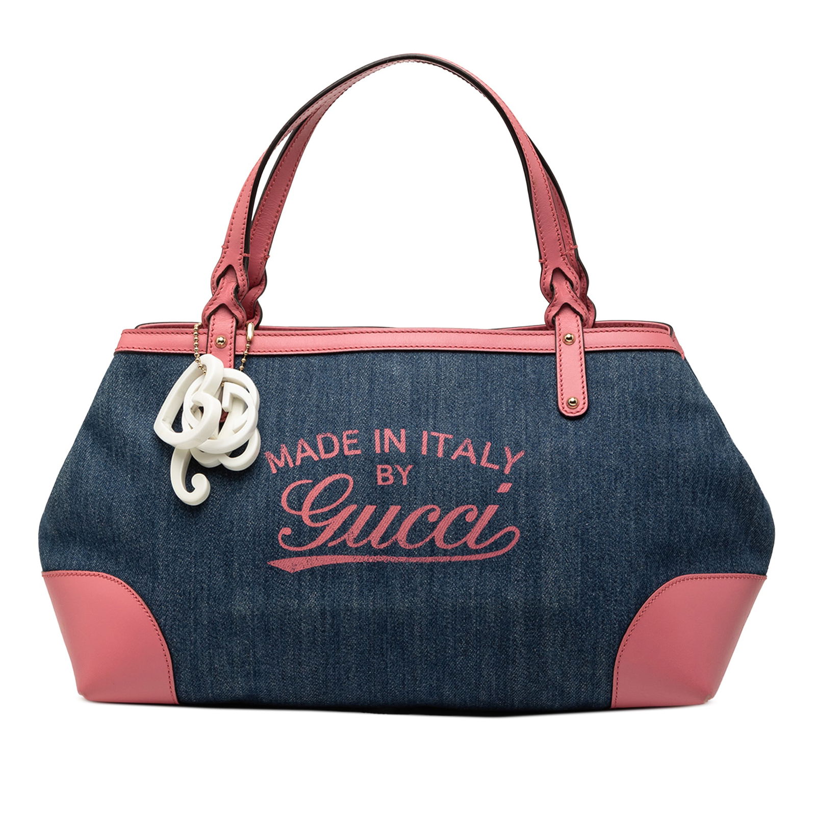 Gucci Blue Denim Craft Tote Bag with Leather Trim and Magnetic Closure: Gucci Blue Denim Craft Tote Bag with Leather Trim and Magnetic Closure This Gucci Denim Craft Tote features a blue denim body with leather trim and flat leather straps. The bag is designed with an ope