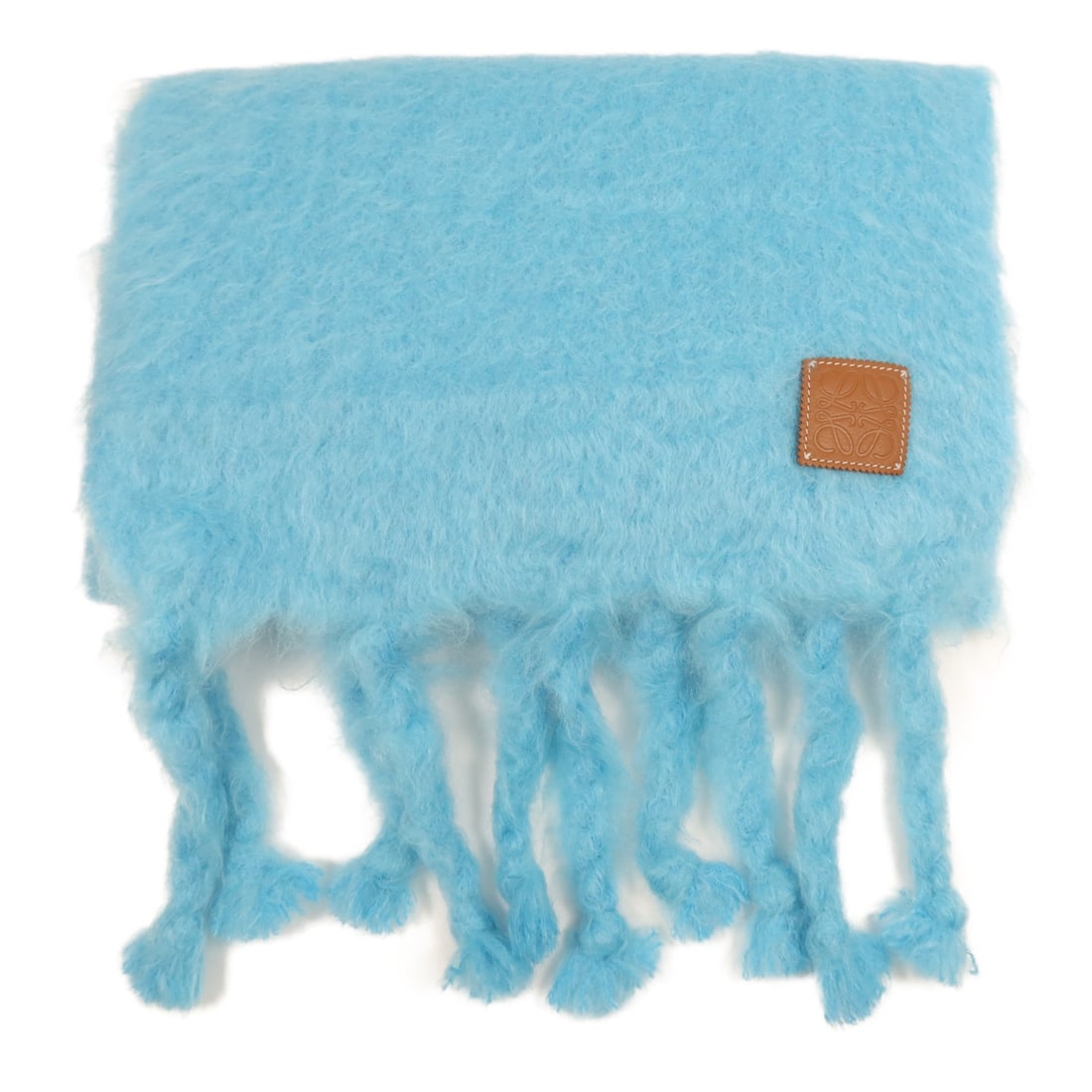 Blue Wool Scarf from LOEWE Fashion Collection: Blue Wool Scarf from LOEWE Fashion Collection This LOEWE scarf is crafted from high-quality wool, offering both warmth and style in a beautiful blue color. Designed in a regular size, this scarf is pe
