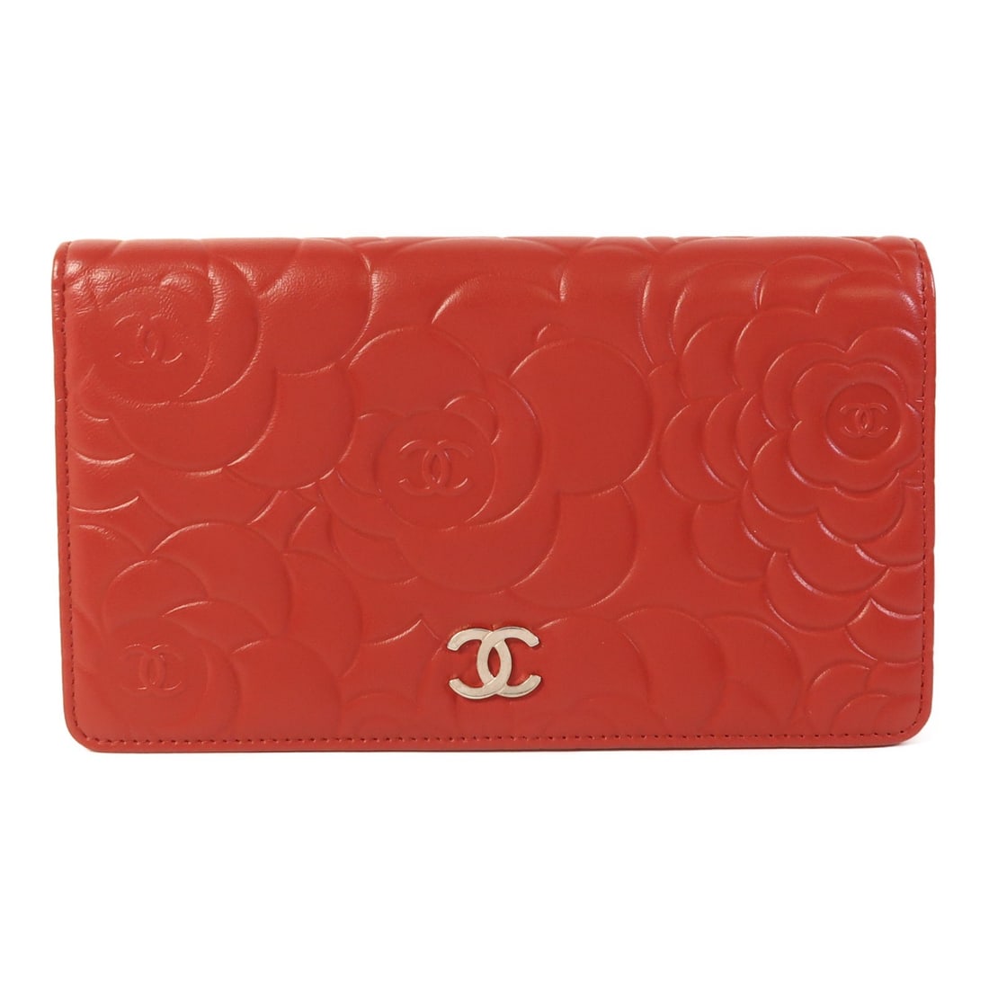 CHANEL Red Lambskin Leather Bifold Wallet with SHW: CHANEL Red Lambskin Leather Bifold Wallet with SHW This elegant CHANEL bifold purse is crafted from luxurious lambskin leather in a striking red color. The wallet features a sleek design, perfect for