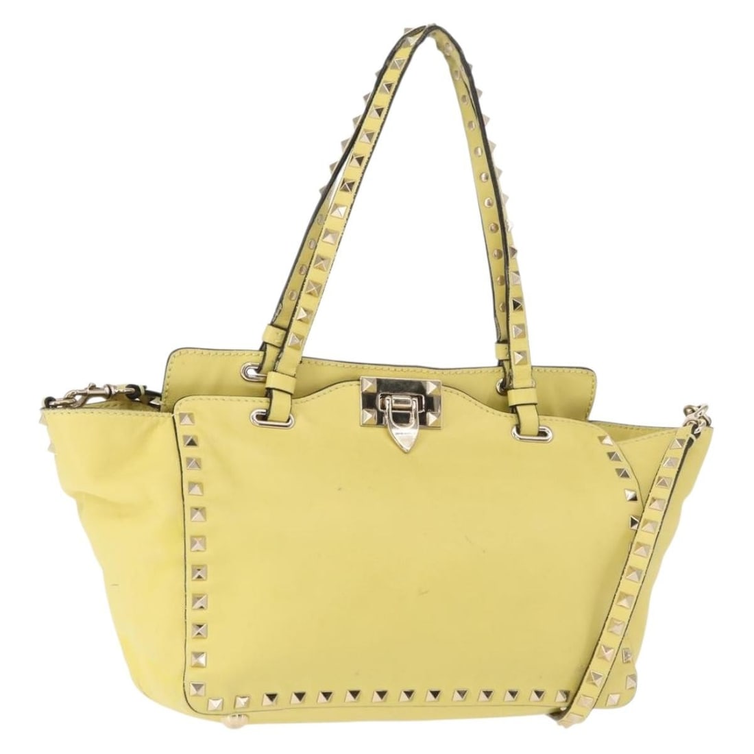 Yellow Valentino Garavani Rockstud Tote Bag in Soft Leather: Yellow Valentino Garavani Rockstud Tote Bag in Soft Leather This Valentino Garavani Rockstud Tote is crafted from soft yellow leather and features the signature Rockstud detailing. Designed for women,