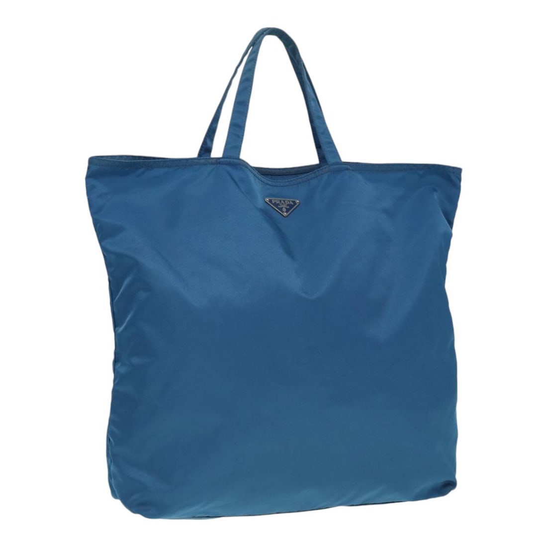 Prada Tessuto Nylon Robot Tote Bag in Blue for Women: Prada Tessuto Nylon Robot Tote Bag in Blue for Women This Prada Robot Open Tote is crafted from blue nylon, designed for women. The tote features a spacious interior and practical pockets. It shows si