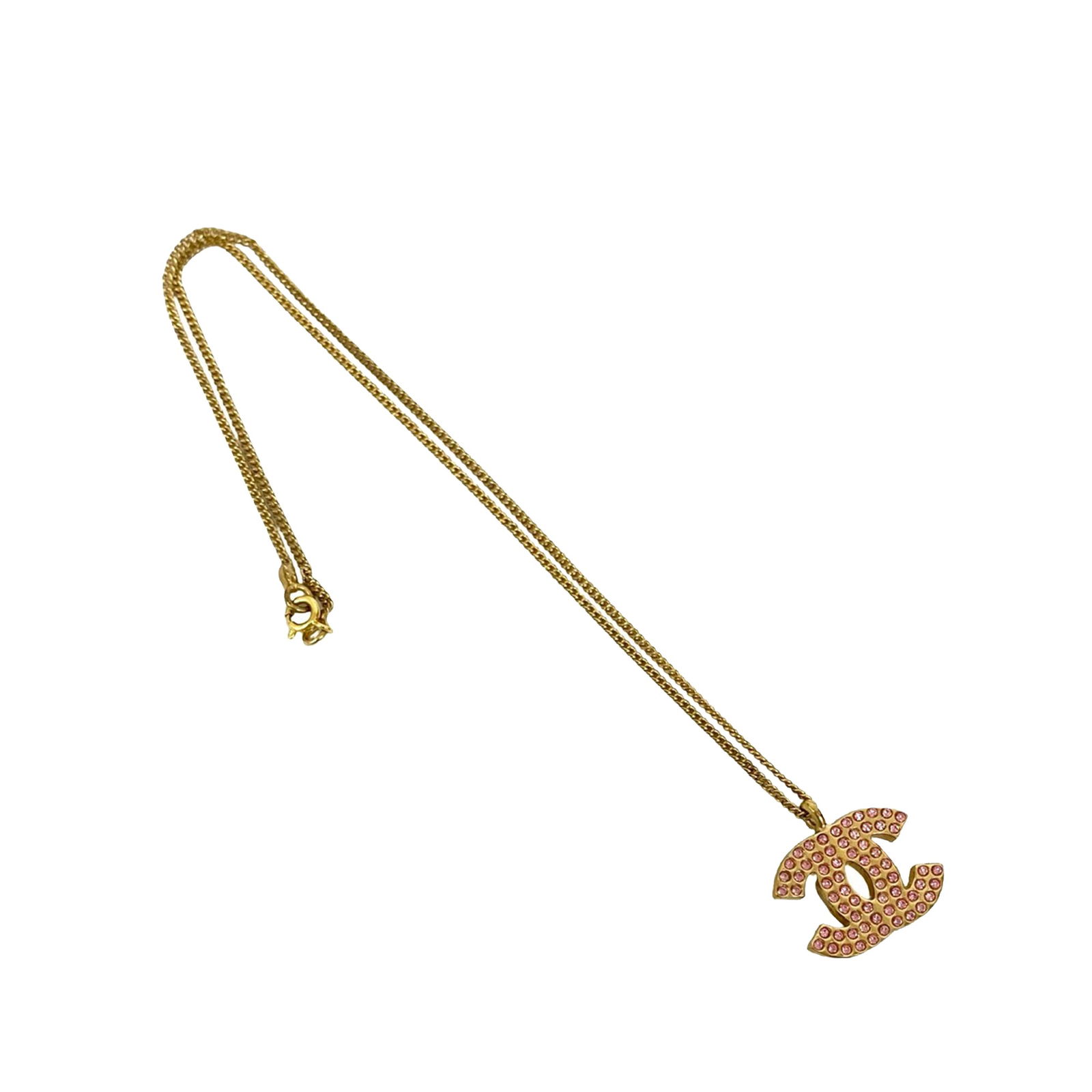 Chanel CC Pendant Necklace with Gold Plating and Rhinestone Accents: Chanel CC Pendant Necklace with Gold Plating and Rhinestone Accents This Chanel necklace features a gold plated metal body adorned with rhinestone embellishments and secures with a spring ring closure