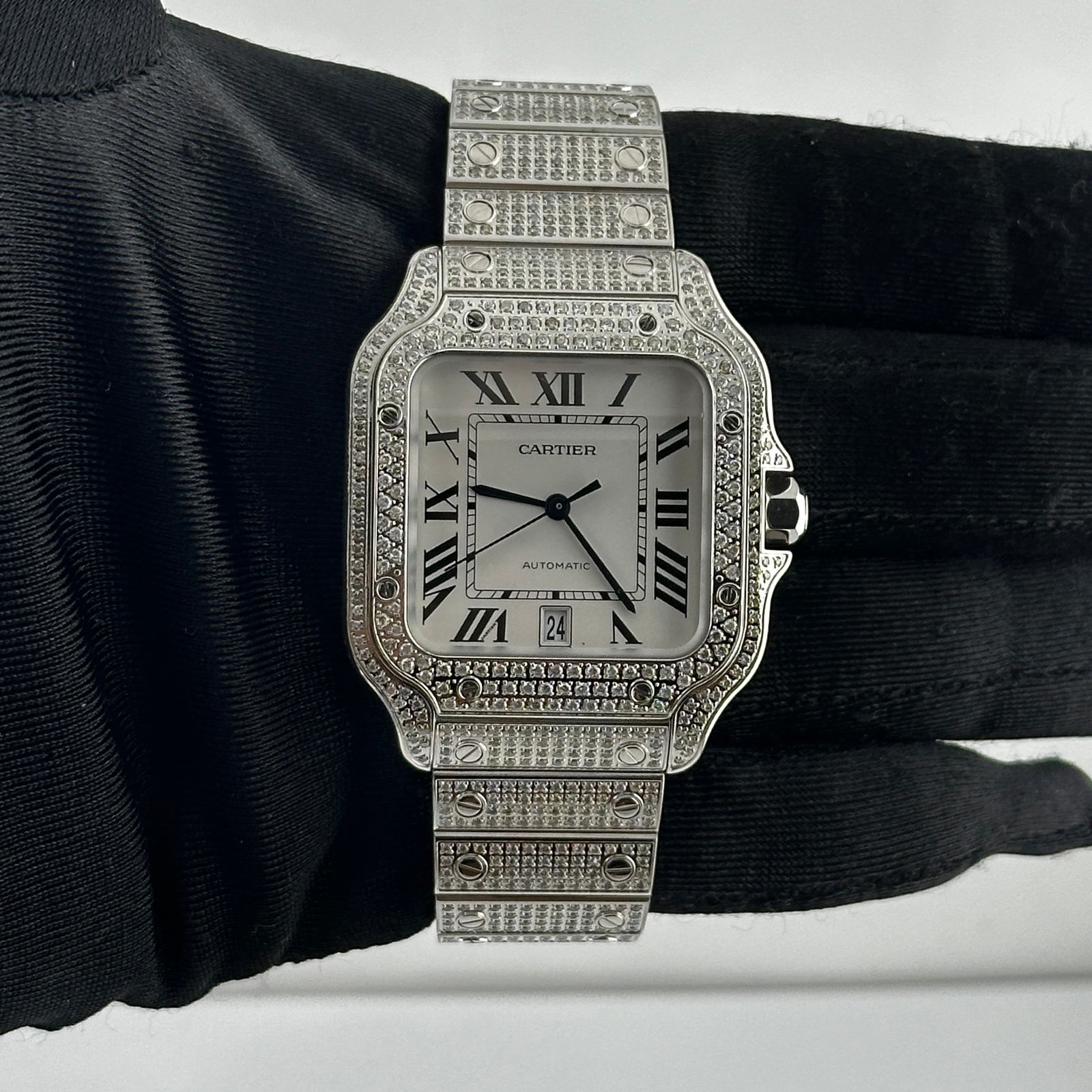 Diamond Bezel Cartier Santos Ref 4072 Silver Roman Dial Watch: Diamond Bezel Cartier Santos Ref 4072 Silver Roman Dial Watch This Cartier Santos watch features a silver Roman numeral dial, a diamond-set bezel, and a diamond bracelet. It is designed for men and is