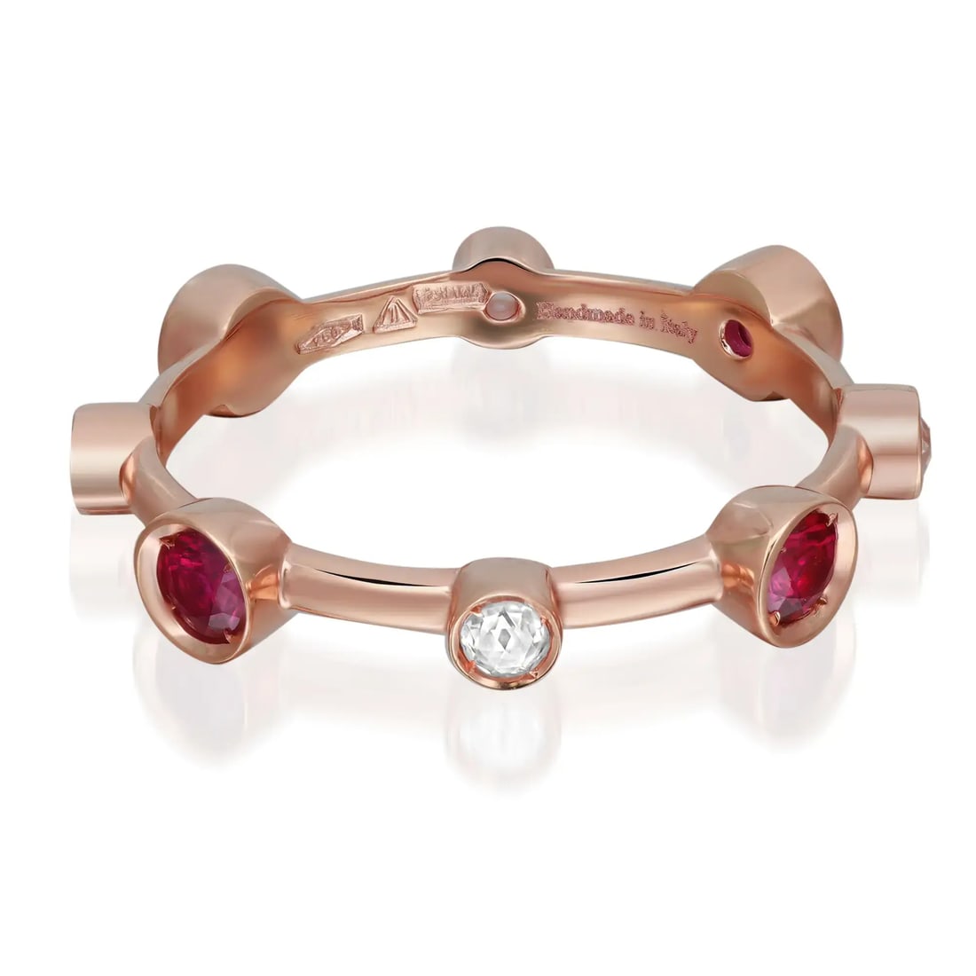 Elegant Damiani Ruby Diamond Band Ring 18K Rose Gold 0.10Cttw Size 7.5: Elegant Damiani Ruby Diamond Band Ring 18K Rose Gold 0.10Cttw Size 7.5 This elegant Damiani band ring showcases a stunning combination of round cut rubies and diamonds, set in a chic bezel style. Craf