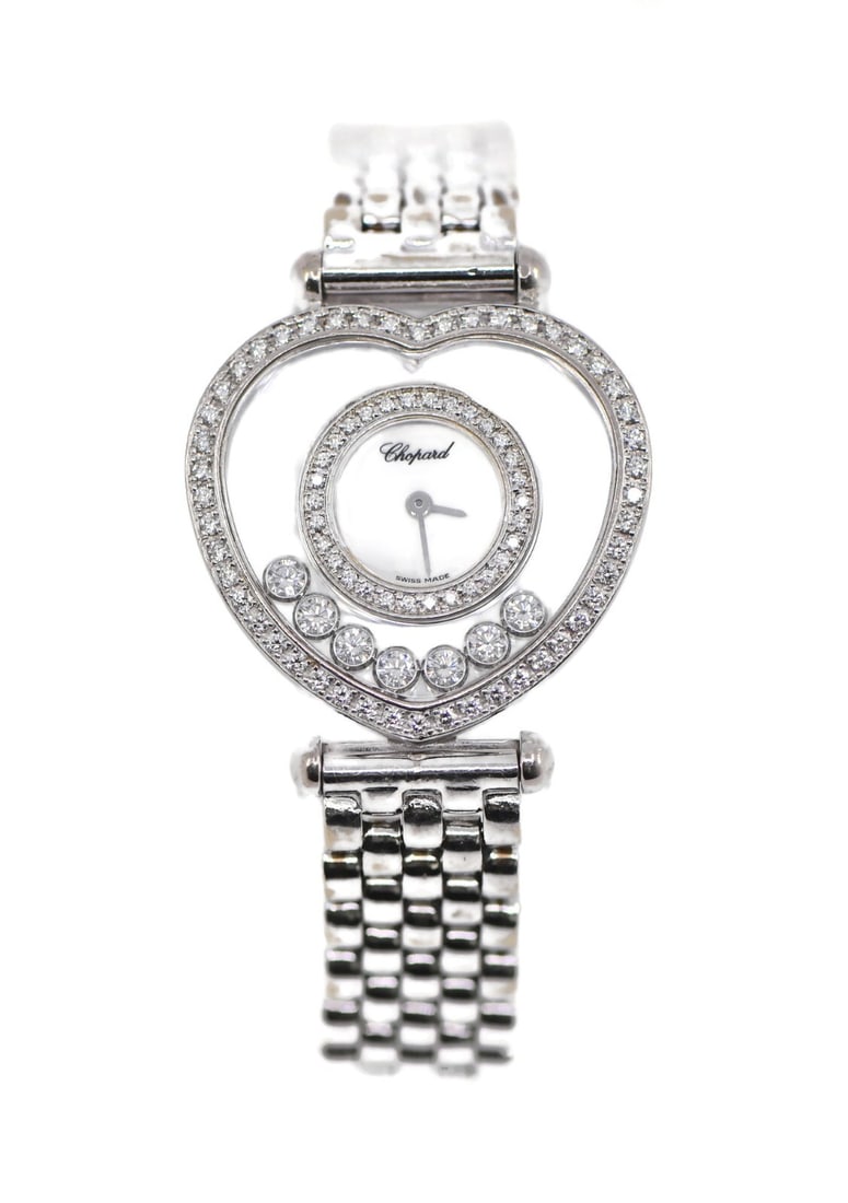 Chopard Happy Diamonds 18K White Gold Watch Ref 20/4516 with Box and Papers: Chopard Happy Diamonds 18K White Gold Watch Ref 20/4516 with Box and Papers This exquisite Chopard Happy Diamonds wristwatch is a stunning blend of elegance and luxury. Crafted in 18K white gold, this