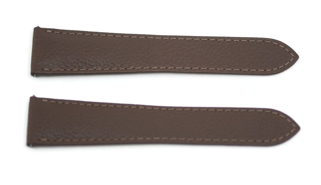 Cartier Authentic Brown Leather Wristwatch Strap 23mm: Cartier Authentic Brown Leather Wristwatch Strap 23mm Elevate your wristwatch with this exquisite Cartier Brown Leather Strap. Crafted from high-quality leather, this strap features a rich brown color