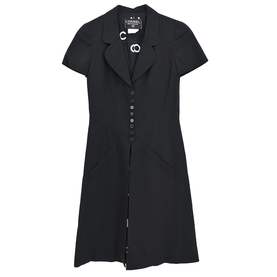 Chanel Black Wool T-Shirt Dress 97P Short Sleeve Collared: Chanel Black Wool T-Shirt Dress 97P Short Sleeve Collared Elevate your casual wardrobe with this elegant Chanel Dress in classic black. Designed with short sleeves and a collared neckline, this long t