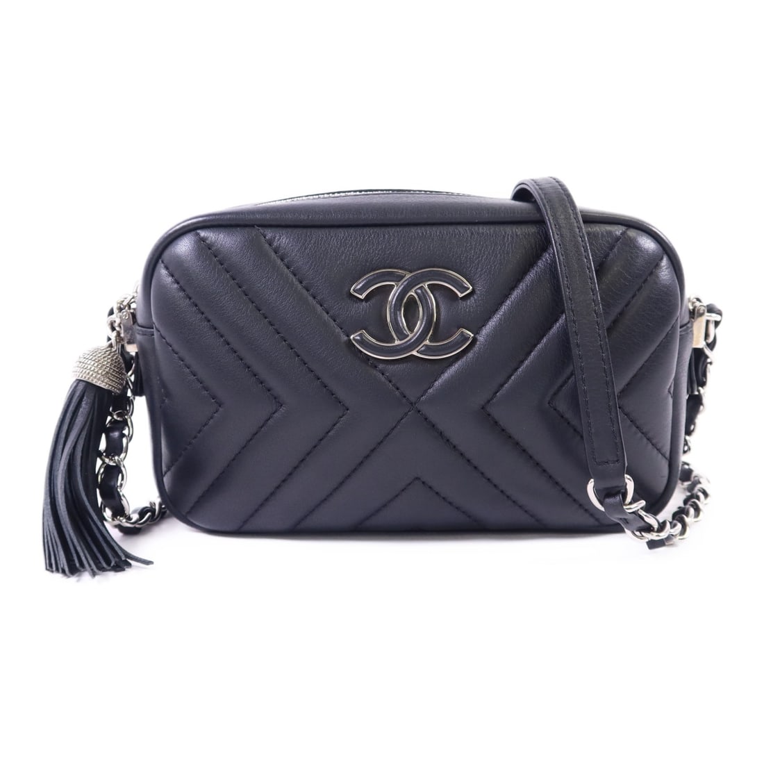 Black Lambskin CHANEL CC Shoulder Bag with Silver Tone Chain: Black Lambskin CHANEL CC Shoulder Bag with Silver Tone Chain This CHANEL shoulder bag is crafted from black lambskin leather and features a chain strap with signature CC details and silver-tone hardwa