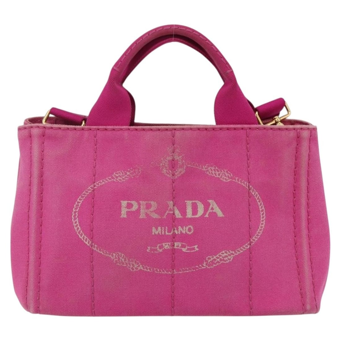 Pink Canvas Prada Canapa Tote Convertible Handbag: Pink Canvas Prada Canapa Tote Convertible Handbag This Prada Canapa Convertible Tote is crafted from pink canvas and designed for women. It features a convertible style with a shoulder strap and metal