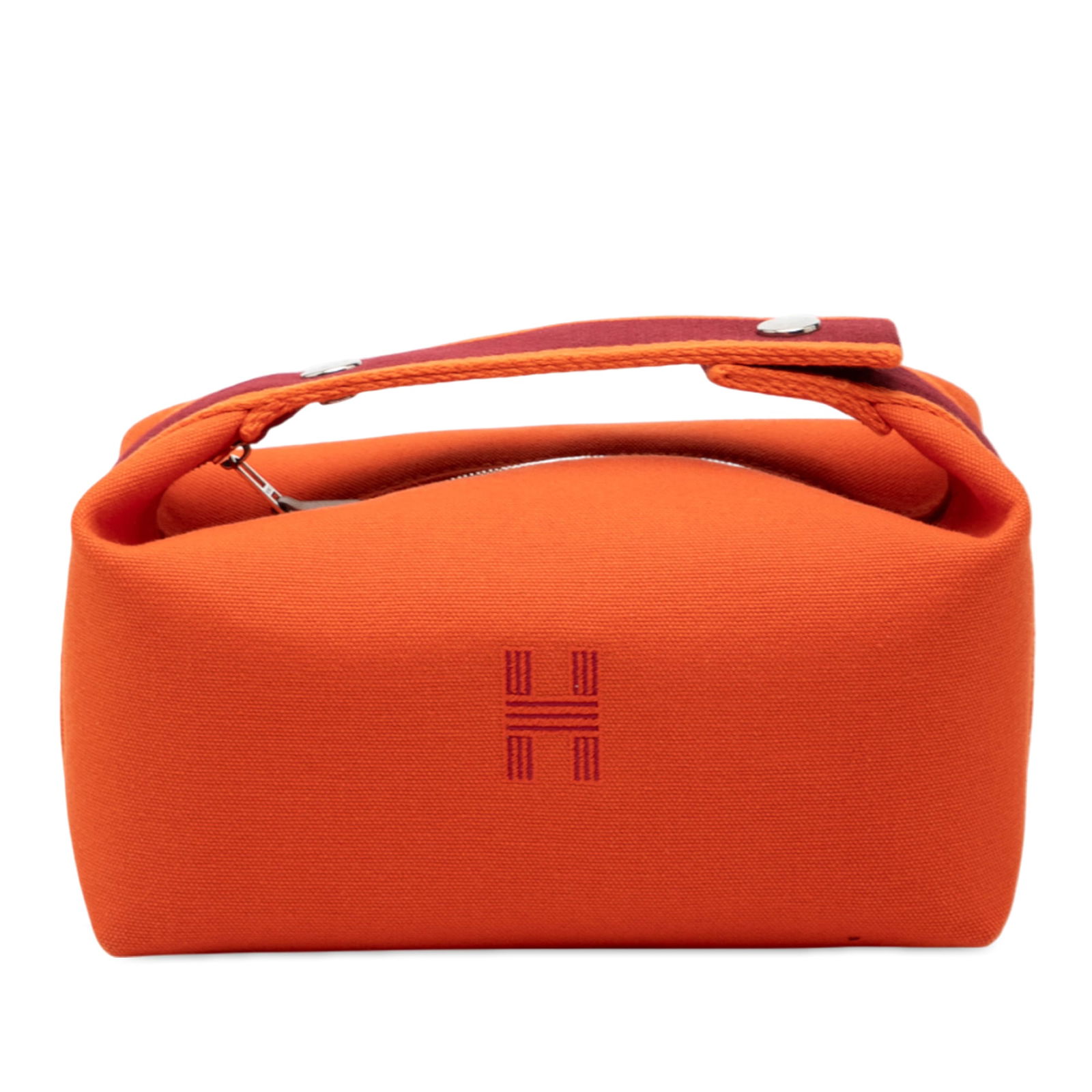 Hermes Small Toile Bride-A-Brac Orange Canvas Pouch with Zip Closure: Hermes Small Toile Bride-A-Brac Orange Canvas Pouch with Zip Closure This Hermes Small Toile Bride A Brac Case features an orange canvas body with a flat handle, a top zip closure, and interior slip p