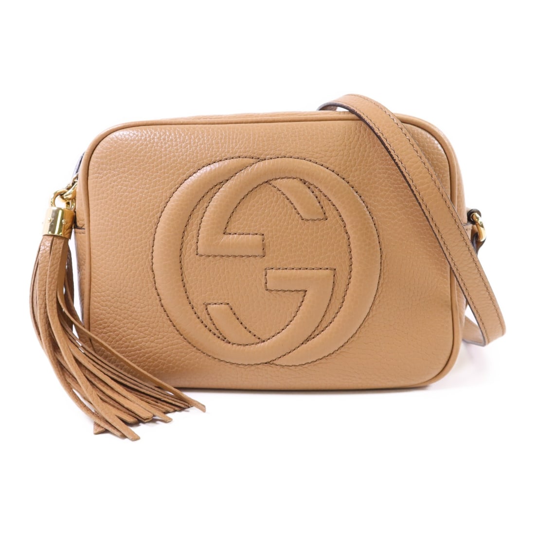 GUCCI GG Soho Beige Calfskin Leather Disco Shoulder Bag: GUCCI GG Soho Beige Calfskin Leather Disco Shoulder Bag This stylish GUCCI GG Soho Disco Shoulder Bag is crafted from luxurious calfskin leather in a classic beige color. The bag features a compact de