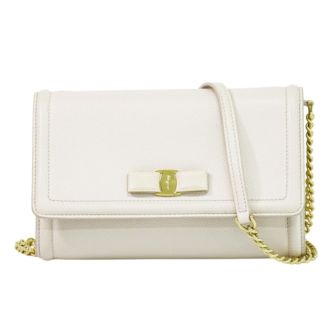 Vara Bow Flap Shoulder Bag in Beige Leather with Chain by Salvatore Ferragamo: Vara Bow Flap Shoulder Bag in Beige Leather with Chain by Salvatore Ferragamo This Salvatore Ferragamo Vara Bow Chain Flap Bag is crafted from beige leather and features the signature Vara bow detail.