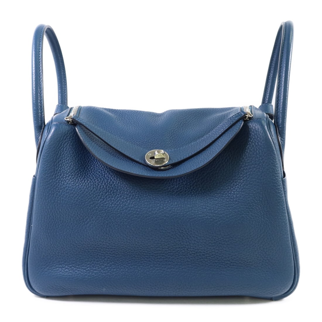 Hermes Lindy 30 Blue Clemence Leather Shoulder Bag with Palladium Hardware: Hermes Lindy 30 Blue Clemence Leather Shoulder Bag with Palladium Hardware This Hermes Lindy 30 is a two-way shoulder handbag crafted from Clemence calfskin leather in a striking blue hue. Made in Fra