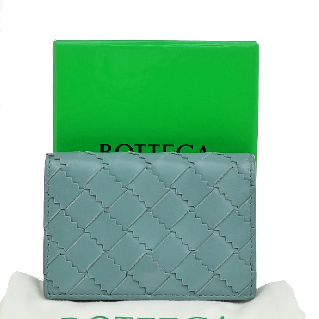 Blue Leather Intrecciato Wallet by Bottega Veneta for Women: Blue Leather Intrecciato Wallet by Bottega Veneta for Women This Bottega Veneta Intrecciato wallet features a classic blue leather design, crafted in Italy. Designed for women, it showcases the signat