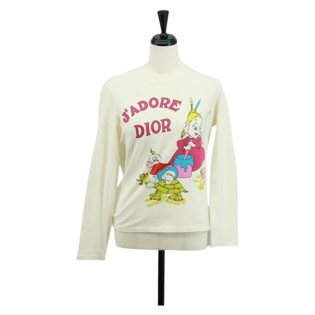 Christian Dior Cotton Long Sleeve White T-shirt Made in France: Christian Dior Cotton Long Sleeve White T-shirt Made in France This Christian Dior long-sleeved T-shirt is crafted from white cotton for comfortable wear. Made in France, it features a classic cut wit