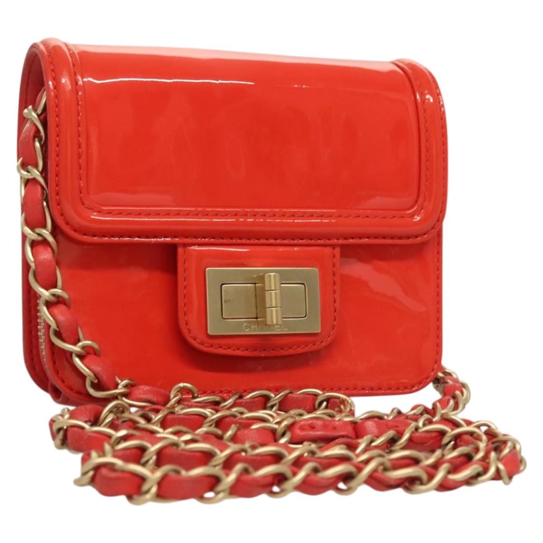 Chanel Reissue 2.55 Quilted Patent Leather Zip Card Holder Wallet: Chanel Reissue 2.55 Quilted Patent Leather Zip Card Holder Wallet This Chanel Reissue 2.55 Square Zip Around Card Holder Wallet is crafted from orange patent leather and designed for women. It feature