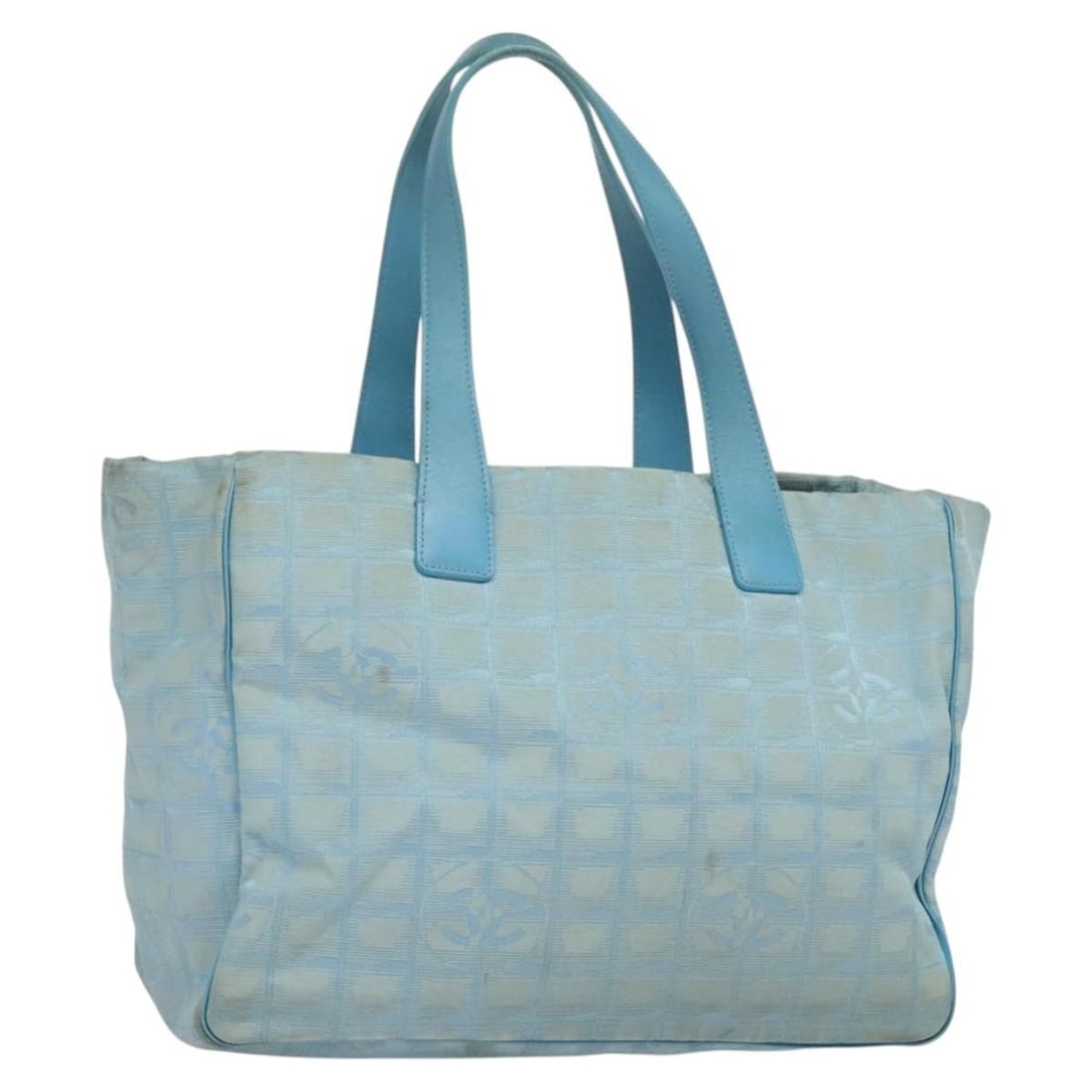 Blue Nylon Chanel Travel Line Tote Bag for Women: Blue Nylon Chanel Travel Line Tote Bag for Women This Chanel Travel Line Tote is crafted from durable blue nylon and designed for female use. Featuring a spacious interior and practical structure, it