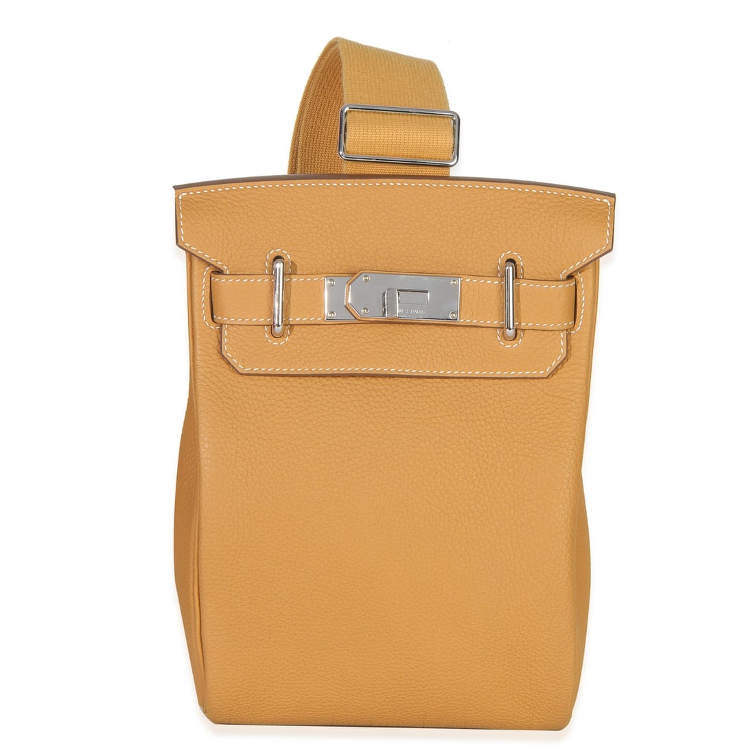 Hac A Dos PM brown leather crossbody bag with silver hardware by Hermes: Hac A Dos PM brown leather crossbody bag with silver hardware by Hermes This Hermes Hac A Dos PM crossbody bag is crafted from brown Togo leather and features silver-tone hardware. The bag has a turnl